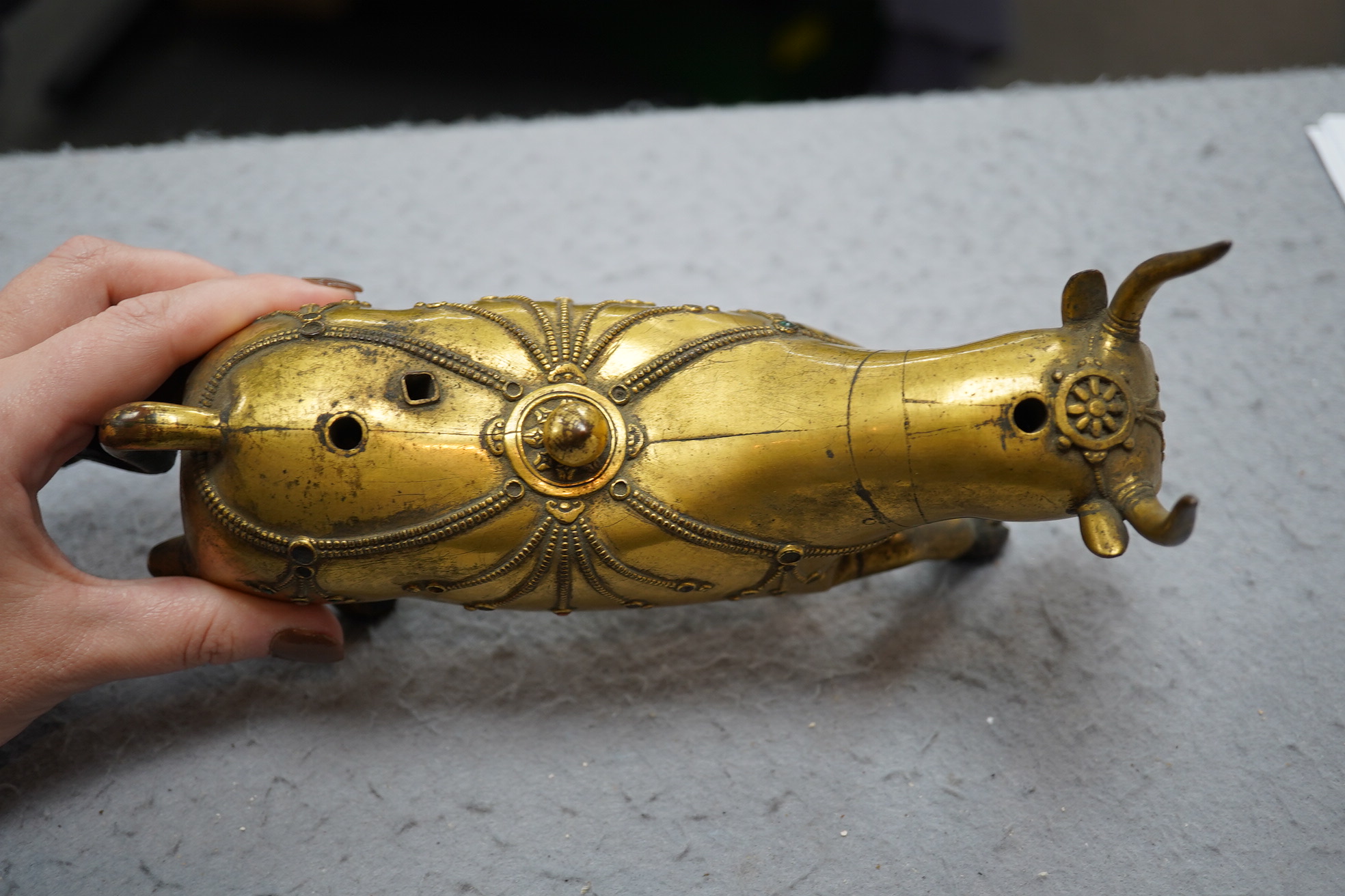 A Tibetan gilt bronze figure of a buffalo, 18th century